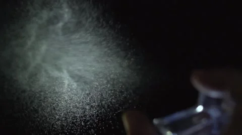Perfume spray on black background Stock Footage 47779546