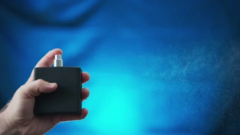 Perfume Spray Cinematic Macro Shot Stockbeeldmateriaal 335468816