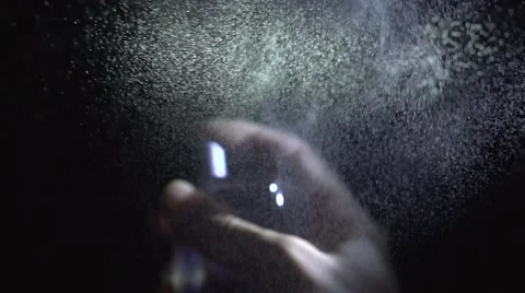 Perfume spraying on camera video with sound Vídeo Stock 47779550
