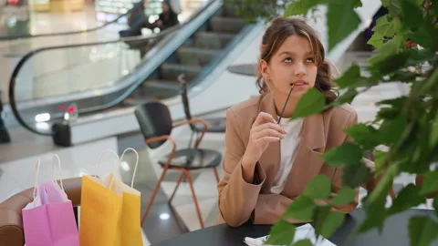 Perfume tasting experience, woman explores fragrance at mall, individual Stock-Footage 326094585