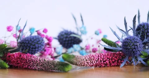 Perfumer creating new aroma liquid parfume putting essential oil on table. Stock Footage 127734095