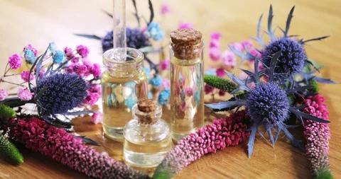 Perfumer creating new aroma liquid parfume taking essential oil from vial. Stock Footage 127734128