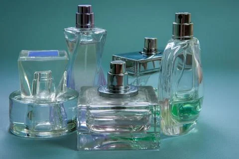 Perfumes in bottles of different shapes Stock Photos