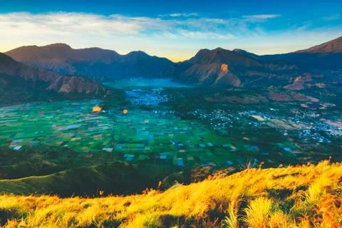 Pergasingan Hill view with multiple mountain peaks and rice field in Sembalun 写真素材