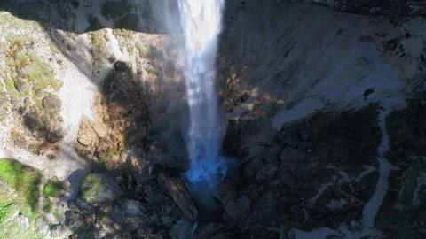 Pericnik Waterfall and rocky cliffs aerial view Stock Footage 327550708