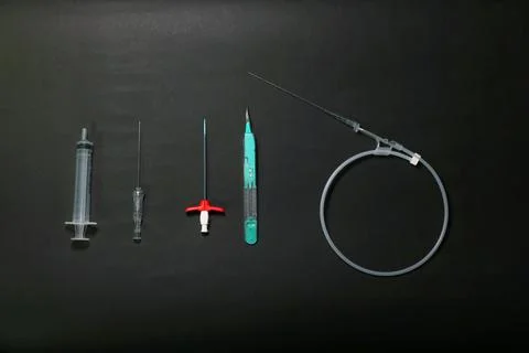 A peripherally inserted central catheter (PICC), insertion equipments arrange Stock Photos