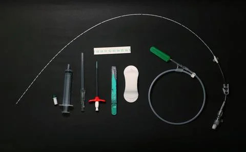 A peripherally inserted central catheter (PICC), insertion equipments arrange Stock Photos