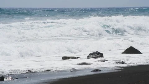 Perissa beach with black volcanic sand in Santorini island, Greece. Video stock 243115810