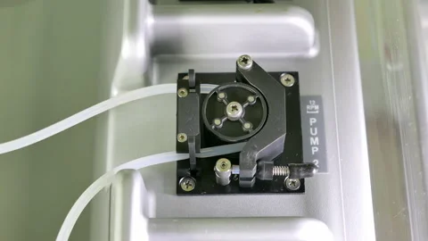 Peristaltic pump working in the biochemistry laboratory Stock Footage 154747529