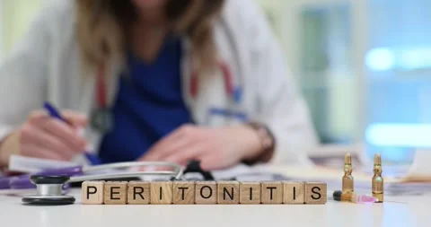 Peritonitis written on cubes placed with ampoules and paperwork Stock Footage 314123827