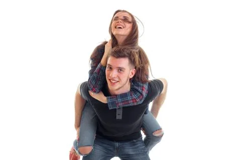 Perky young guy keeps on his back his sweet girl Stock Photos