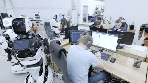 PERM RUSSIA - 13.12.2018: A group of software engineers create software code for Stock Footage 101558140