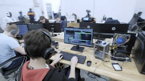 PERM RUSSIA - 13.12.2018: A group of software engineers create software code for Stock Footage 101558889
