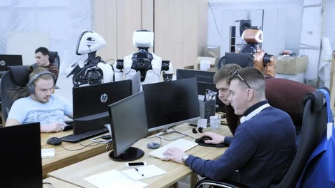 PERM RUSSIA - 13.12.2018: A group of software engineers create software code for Stock Footage 101560023