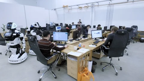 PERM RUSSIA - 13.12.2018: A group of software engineers create software code for Stock Footage 101560037