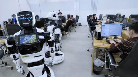 PERM RUSSIA - 13.12.2018: A group of software engineers create software code for Stock Footage 101560423