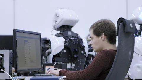 PERM RUSSIA - 13.12.2018: A group of software engineers create software code for Stock Footage 101563159