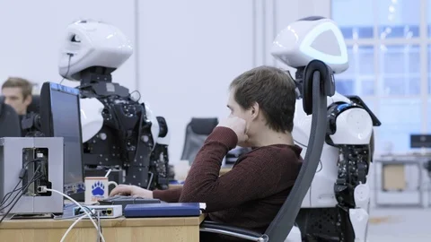 PERM RUSSIA - 13.12.2018: A group of software engineers create software code for Stock Footage 101563356