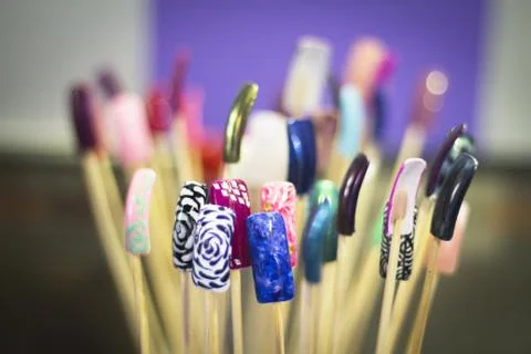 Permanent acrylic nail sample. Different designs Stock Photos