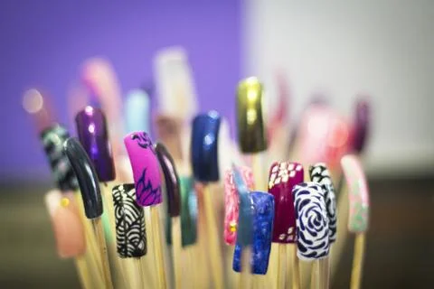 Permanent acrylic nail sample. Different designs Stock Photos