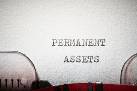 Permanent assets text written with a typewriter. Stock Photos