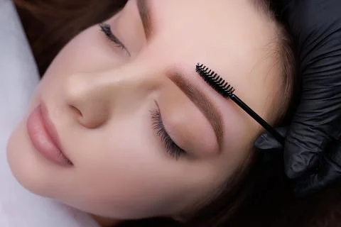Permanent eyebrow makeup PMU procedure Foto stock
