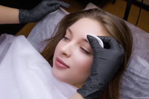 Permanent eyebrow makeup PMU procedure Stock Photos