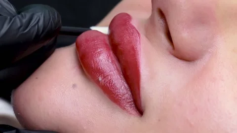 Permanent lip makeup procedure Stock Footage 194563607