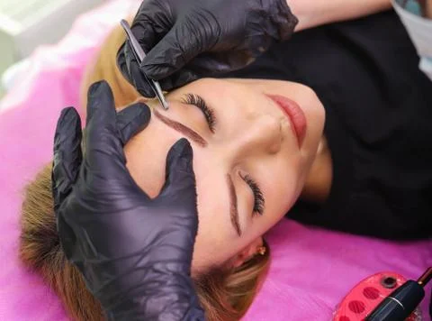 Permanent make up on eyebrows. Stock Photos