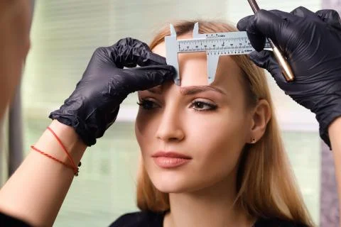 Permanent make up on eyebrows. Stock Photos