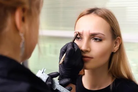 Permanent make up on eyebrows. Stock Photos