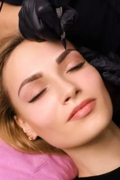 Permanent make up on eyebrows. Stock Photos