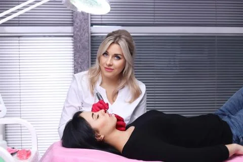 Permanent Make-up on her Lips. Stock Photos