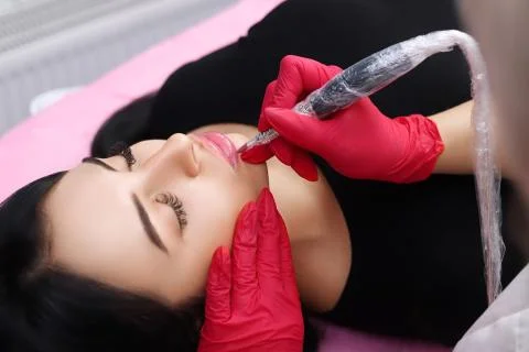 Permanent Make-up on her Lips. Stock Photos