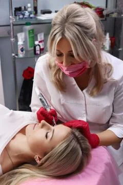 Permanent Make-up on her Lips. Stock Photos