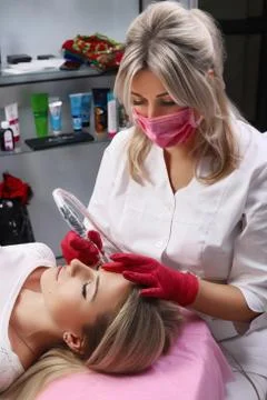 Permanent Make-up on her Lips. Stock Photos