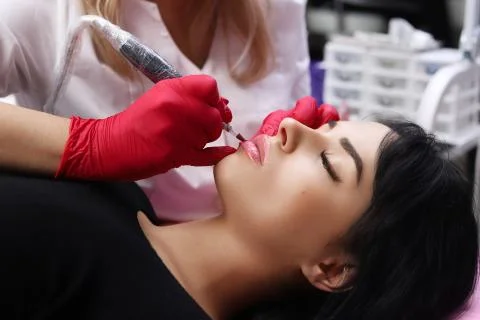 Permanent Make-up on her Lips. Stock Photos