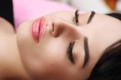 Permanent Make-up on her Lips. Stock Photos