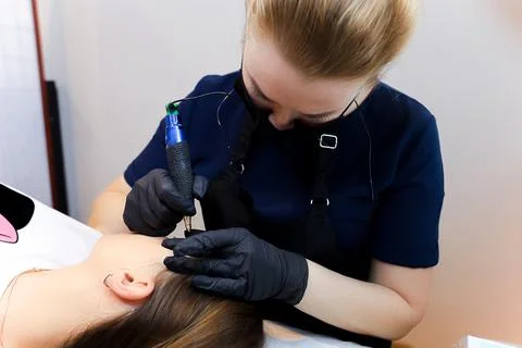 Permanent make-up master Stock Photos
