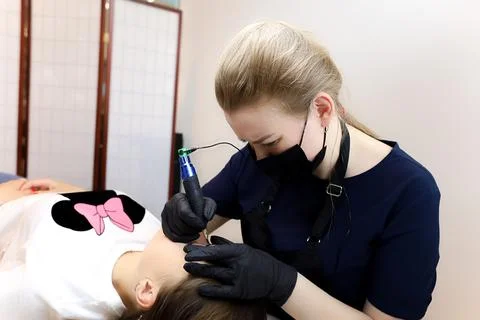 Permanent make-up master Stock Photos