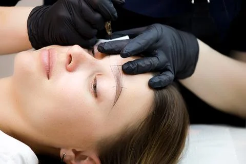 Permanent make-up master Stock Photos