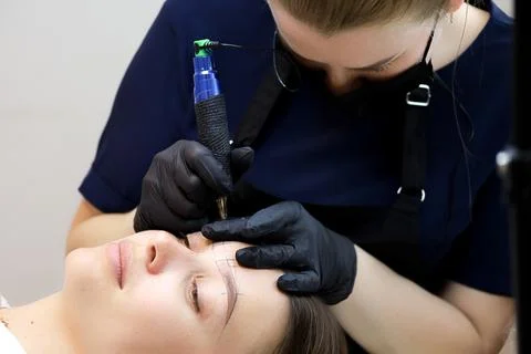 Permanent make-up master Stock Photos