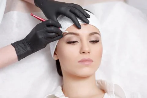 Permanent makeup eyebrows Stock Photos