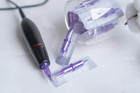 Permanent makeup machine for eyebrows and lips Stock Photos