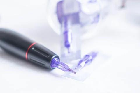 Permanent makeup machine for eyebrows and lips Stock Photos