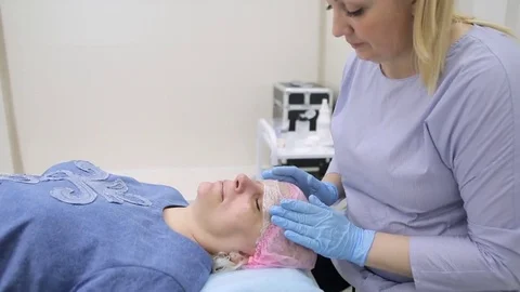 Permanent makeup. Permanent tattooing of eyebrows. Stock Footage 80033390