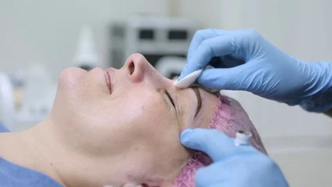 Permanent makeup. Permanent tattooing of eyebrows. Stock Footage 80034514