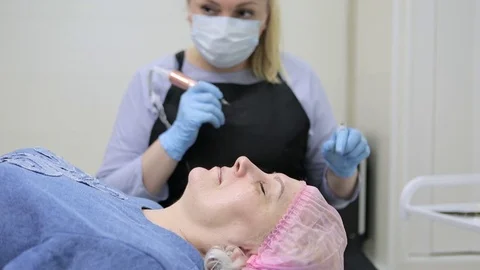 Permanent makeup. Permanent tattooing of eyebrows. Stock Footage 80034768