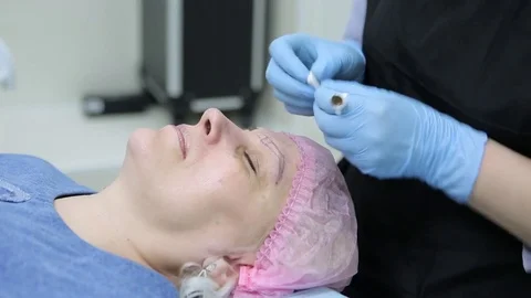 Permanent makeup. Permanent tattooing of eyebrows. Stock Footage 80088295