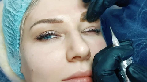 Permanent makeup. Permanent tattooing of eyebrows Stock-Footage 109548211